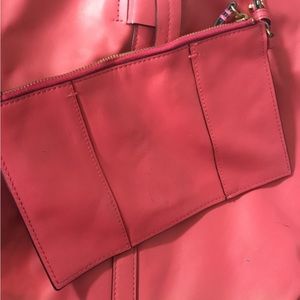 Salmon pink leather shoulder bag winside change purse.In good preowned condition